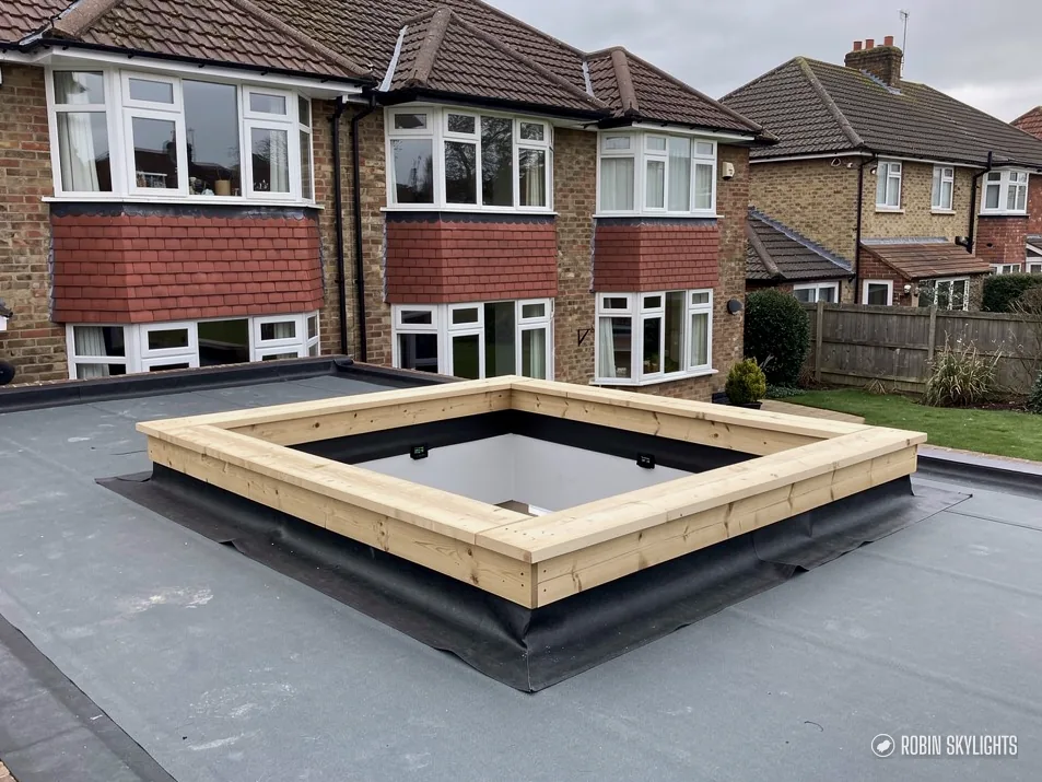 New insulated timber kerb around an opening on a flat roof, ready for a lantern